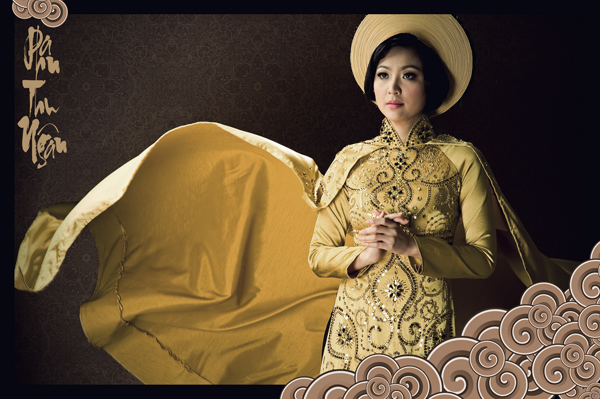 Phan Thu Ngân đón Tết với áo dài rồng - Hình 6