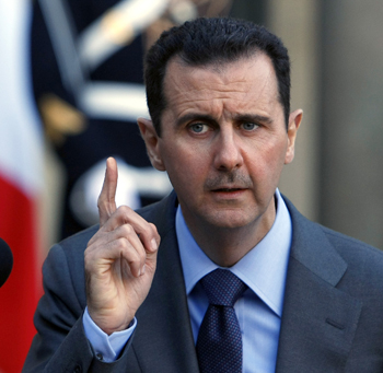 Tổng thống Syria thăm nhà thờ khi chiến sự đang leo thang - Hình 1