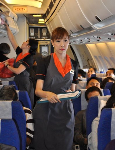 Vẻ đẹp của tiếp viên hàng không chuyển giới ở Thái Lan - Hình 16