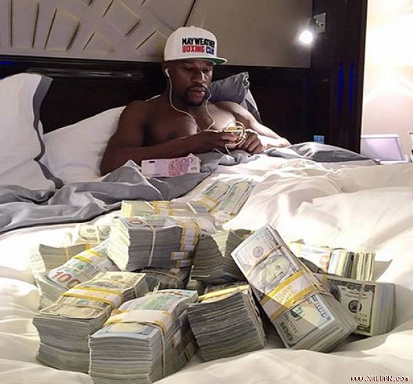 Mayweather thực sự bỏ túi bao nhiêu sau trận quyền anh thế kỷ - Hình 1