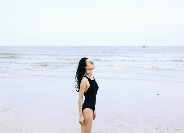 Hoa hậu Trần Thị Quỳnh khoe ảnh mặc bikini hiếm hoi - Hình 6