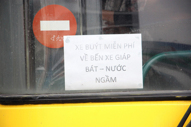 Bến xe Mỹ Đình vắng vẻ lạ thường ngày đầu nghỉ Tết - Hình 9