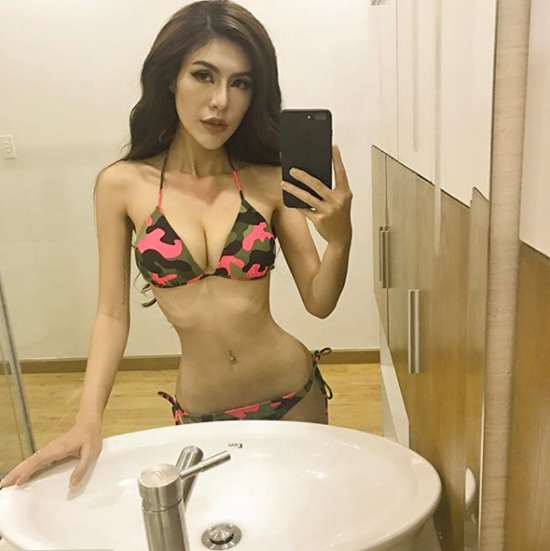 Đường cong như búp bê đẹp khó tin của kiều nữ áo dài Sài Thành - Hình 4