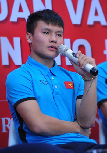 Bất ngờ với dòng chữ xăm trên tay trái Quang Hải đội U23 Việt Nam - Hình 1
