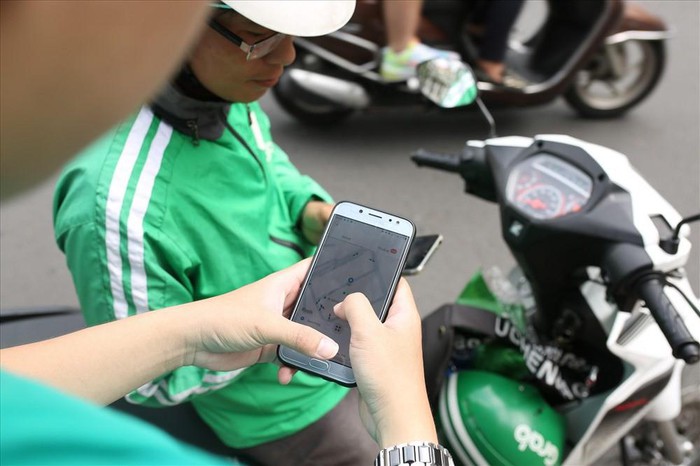 Grab thu phí nếu chờ khách quá 5 phút: Đẩy khó cho khách hàng? - Hình 1