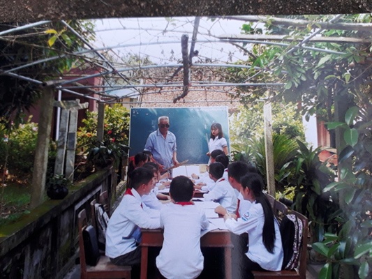 Người thương binh miệt mài dạy học - Hình 1