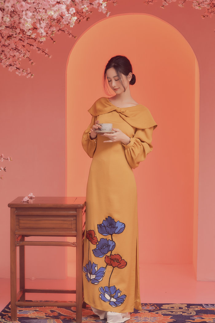 Jun Vũ hóa nàng thơ thanh nhã, diện áo dài tha thướt đón mùa Xuân - Hình 11