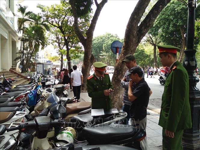 Nhiều bãi trông xe chặt chém dịp Tết Dương lịch - Hình 1