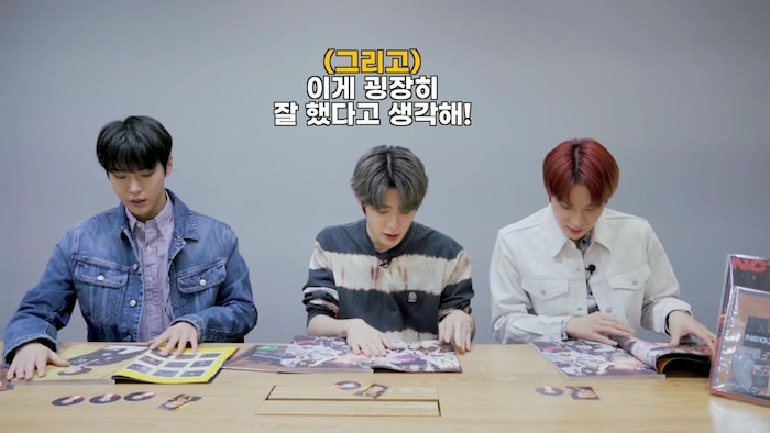 Ngã ngửa trước cách NCT 127 hành hạ album của chính mình: Hết lấy card chơi đập thẻ đến cắt luôn ảnh của chính mình làm...ốp điện thoại - Hình 1