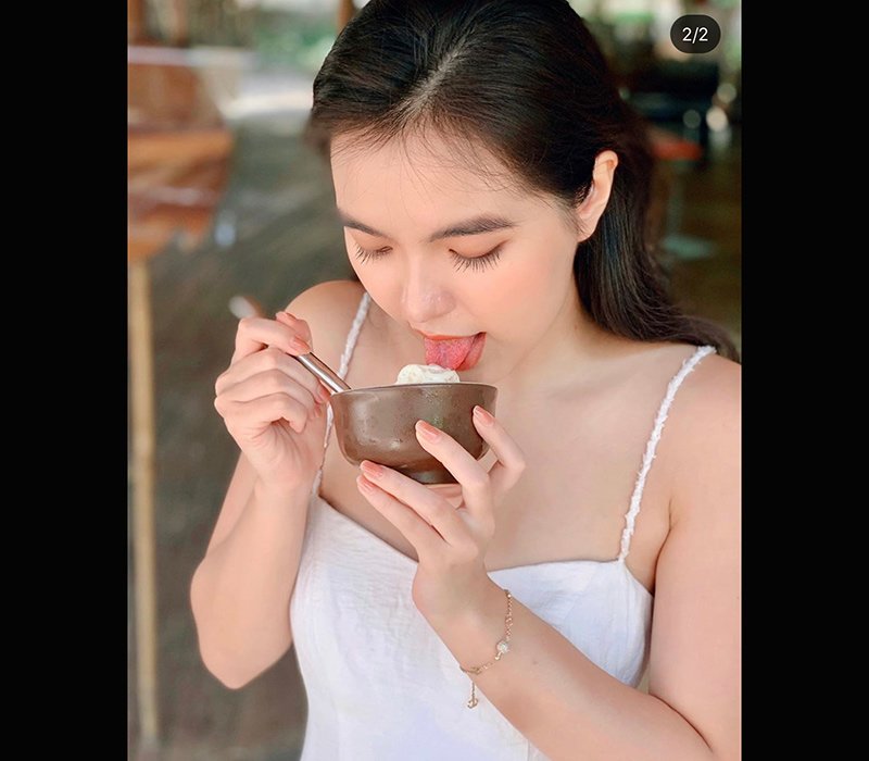 Vô tình bị chụp lén khi ăn kem, cô nàng trở thành hiện tượng nhan sắc giới hot girl Việt - Hình 1
