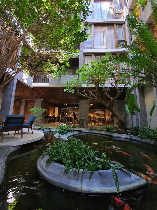 Tòa nhà ở Đà Nẵng ẩn giấu cả khu vườn nhiệt đới tuyệt đẹp bên trong - Hình 3