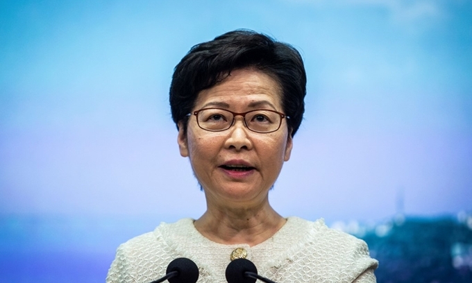Carrie Lam cam kết thực thi mạnh mẽ luật an ninh - Hình 1