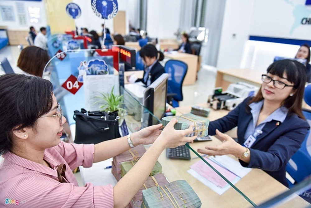 Ngân hàng thừa vốn, lãi suất giảm diện rộng - Hình 1