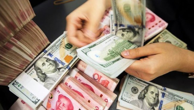 Tiền Việt đang mạnh hơn so với tiền Trung Quốc - Hình 1