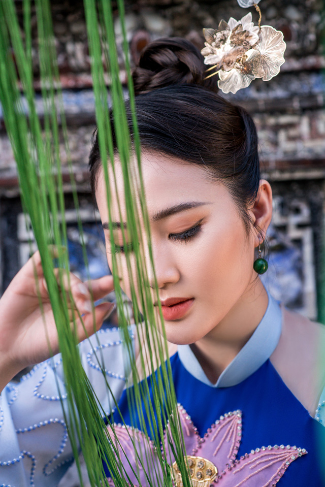 Mỹ nhân có mái tóc đẹp nhất Hoa hậu Việt Nam 2016 tái xuất với áo dài hoa sen - Hình 7
