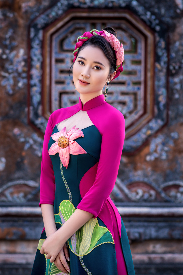 Mỹ nhân có mái tóc đẹp nhất Hoa hậu Việt Nam 2016 tái xuất với áo dài hoa sen - Hình 8