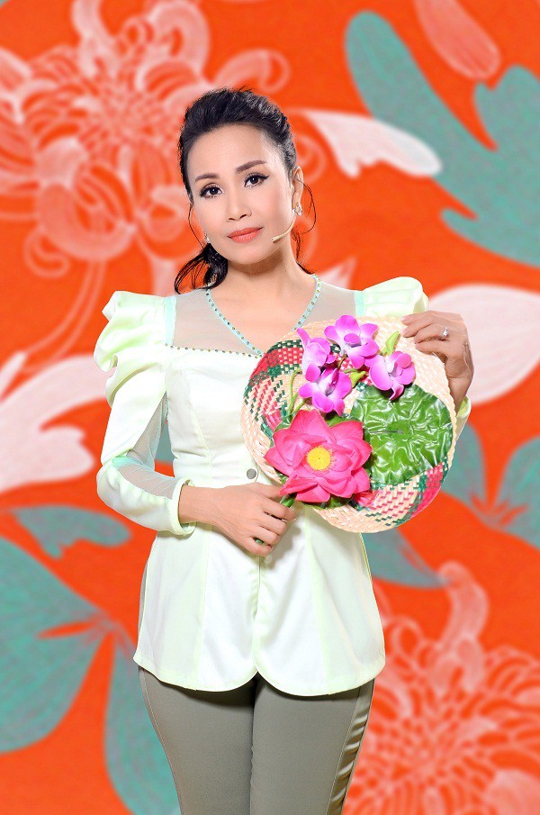 Chị Tư Cẩm Ly bất ngờ ra hẳn hai ca khúc mang màu sắc đối lập để chào năm 2021 - Hình 4
