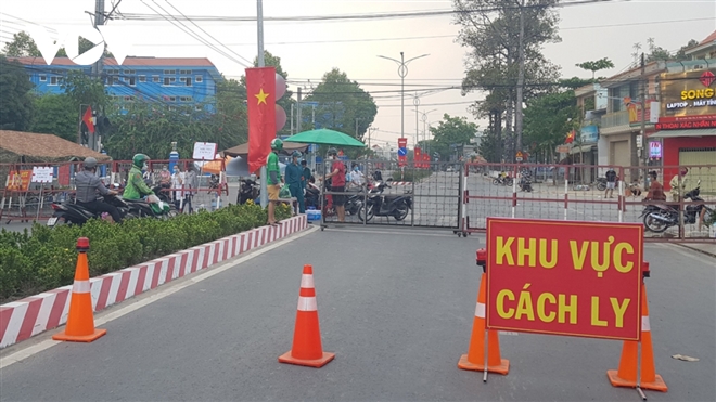 Bình Dương gỡ bỏ cách ly khu vực nữ sinh tiếp xúc gần BN1843 sinh sống - Hình 1