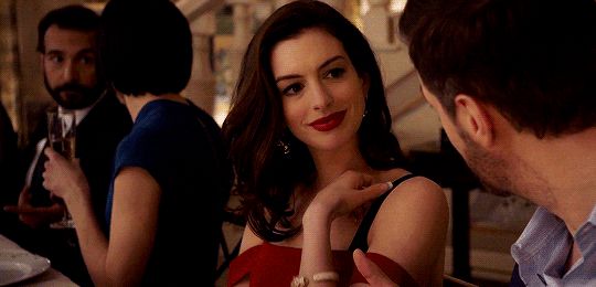 The bust-busting scene is legendary: Anne Hathaway glides backstage and is breathtakingly sexy, her perky breasts seem about to spill out - Photo 6