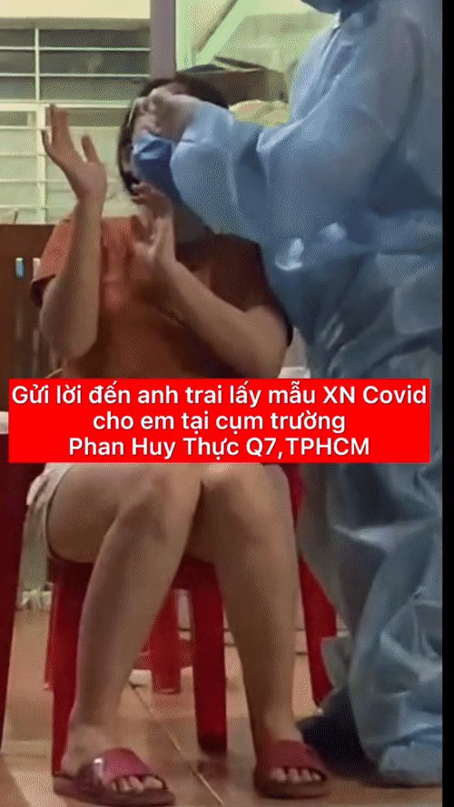 Cái xoa đầu hơn 1 triệu lượt xem của nhân viên y tế dành cho cô gái khi test nhanh Covid-19 - Hình 1