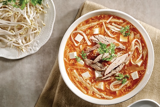Súp măng vịt chua cay - Hình 1