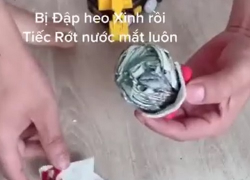 Đập heo đất tí hon đón Tết, gia chủ khiến dân tình ngỡ ngàng vì phần ruột bên trong - Hình 1