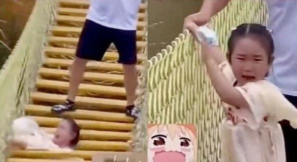Cha đùa dai làm con gái rơi khỏi cầu treo ở Trung Quốc - Hình 1