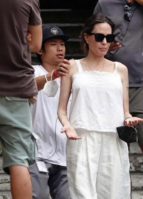 Pax Thien suddenly appeared with a romantic appearance and was asked about her adoptive mother Angelina Jolie - Photo 2
