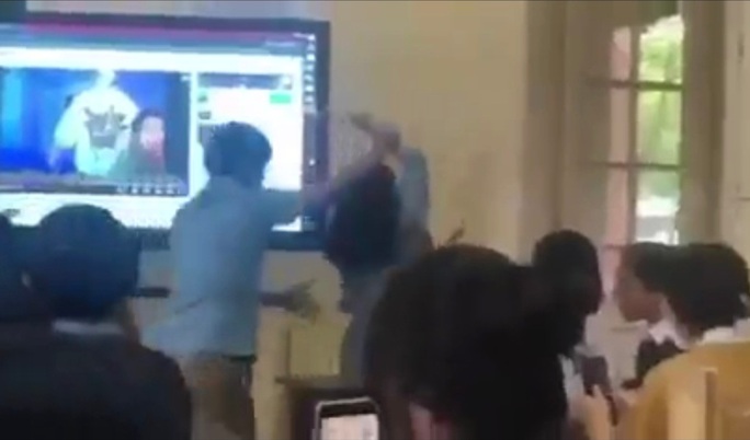 Yêu cầu làm rõ clip nữ giáo viên bị nam đồng nghiệp đẩy ra khỏi phòng học - Hình 1