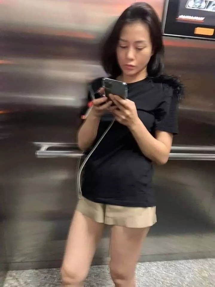 Phương Oanh diện đồ rộng, tạo dáng che khéo vòng 2, netizen nghi có tin vui với Shark Bình - Hình 5