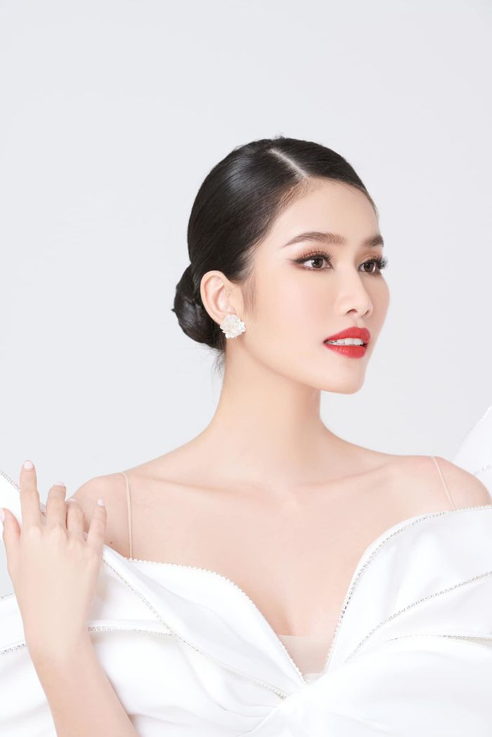 Phương Anh gây tranh cãi trong phần thi Trang phục áo tắm ở MI 2022: Fan khuyên không búi tóc vía - Hình 2