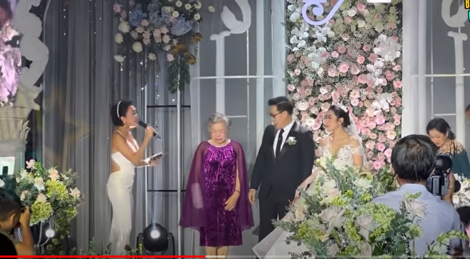 Mẹ ruột Vua cá Koi buồn ra mặt tại đám cưới, thái độ lạnh lùng với con dâu Hà Thanh Xuân? - Hình 2
