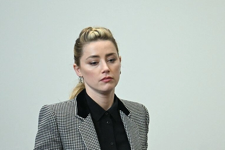Amber Heard yêu cầu thay đổi luật pháp - Hình 1
