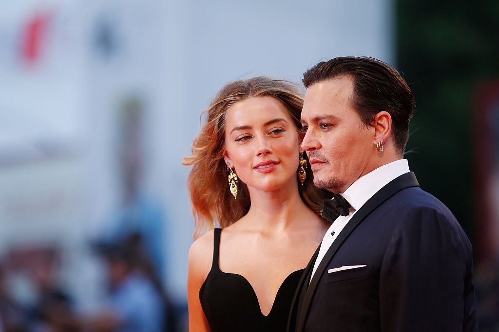 Amber Heard begs Johnny Depp&#39;s mercy? - Photo 1
