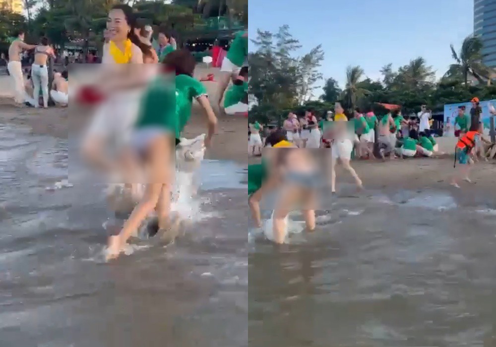2 cô gái trong nhóm du khách lột áo ngực phản cảm ngay giữa bãi biển Cửa Lò - Hình 3