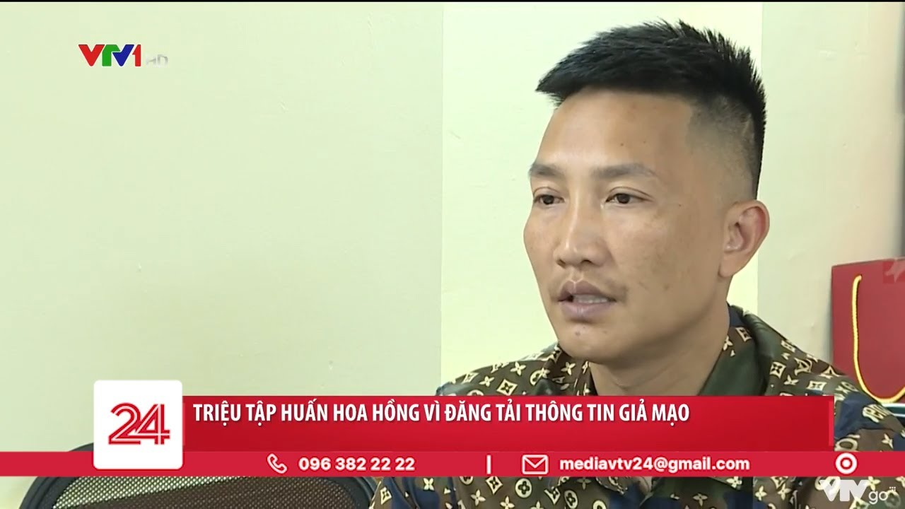 Huấn Hoa Hồng bị người dân chụp ảnh tại trụ sở công an - Hình 5