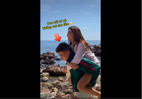 Hoa hậu Thùy Tiên được trai đẹp cõng trên lưng, Quang Linh Vlog đã thấy và đánh giá? - Hình 4