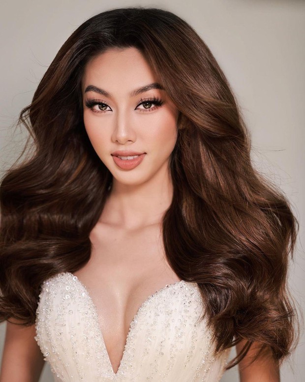 Thùy Tiên 'làm mưa làm gió' sau khi trở về Việt Nam: Khoe clip cực nóng bỏng với bộ váy rực lửa - Hình 1