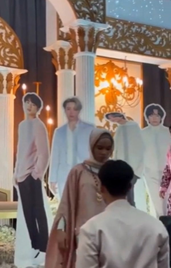 Cô dâu đặt ảnh 7 chàng trai nhóm nhạc BTS khắp sân khấu đám cưới, chú rể có phản ứng bất ngờ - Hình 3