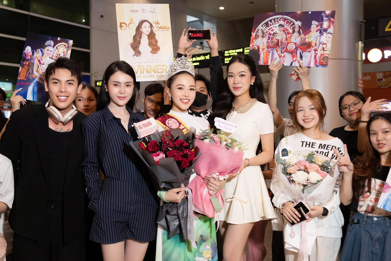 The Miss Globe 2024: Đỗ Hà Trang diện áo dài nền nã về nước, fan vây kín sân bay - Hình 5
