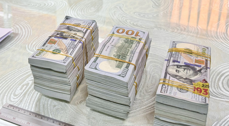 Vận chuyển trái phép 150.000 USD qua biên giới - Hình 2