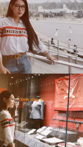 Dàn WAGs xinh đẹp diện áo dài, cầm cờ Việt Nam yêu nước: Doãn Hải My hay Chu Thanh Huyền ấn tượng hơn? - Hình 2