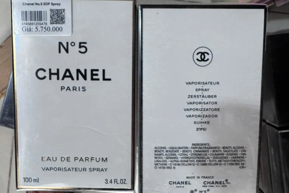 Đường dây bán hơn 10.000 chai nước hoa giả Chanel, Versace ở TPHCM - Hình 3