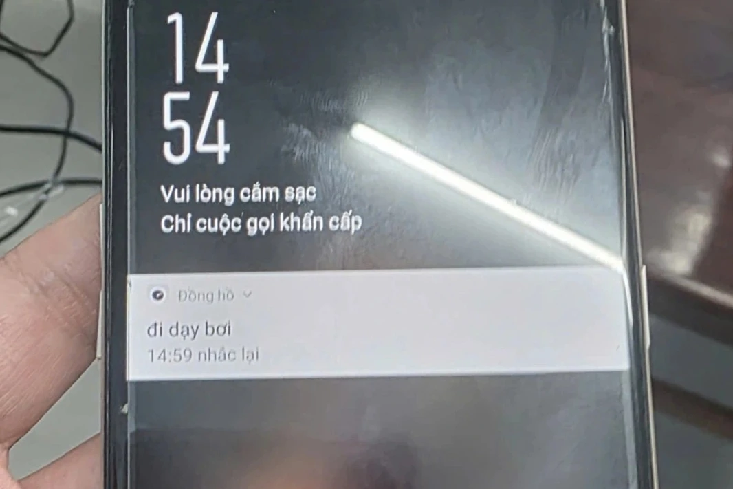 Công an tìm được chủ nhân điện thoại từ manh mối báo thức lúc 14h54 - Hình 1