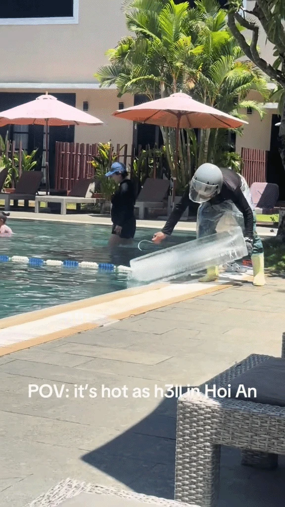 Nắng nóng đỉnh điểm: Resort Hội An thả khối đá khổng lồ xuống bể bơi để khách Tây giải nhiệt cấp tốc - Hình 1