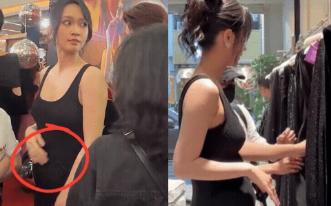 Vũ Thúy Quỳnh mặc váy rộng vẫn không giấu nổi vòng 2 lùm lùm - Hình 2