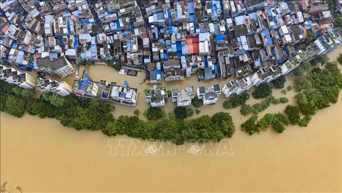 Trung Quốc: Kích hoạt cơ chế ứng phó khẩn cấp với mưa bão, lũ lụt ở miền Nam - Hình 1