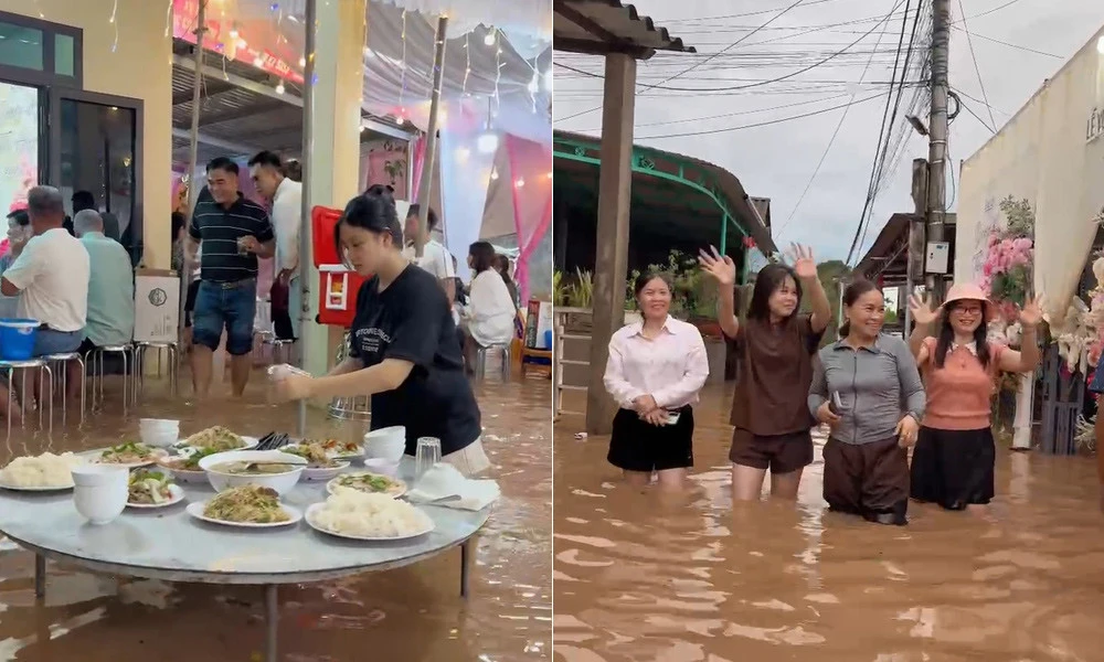 Đám cưới ngày ngập lụt ở Quảng Trị, quan khách xắn quần lội nước ăn cỗ - Hình 1